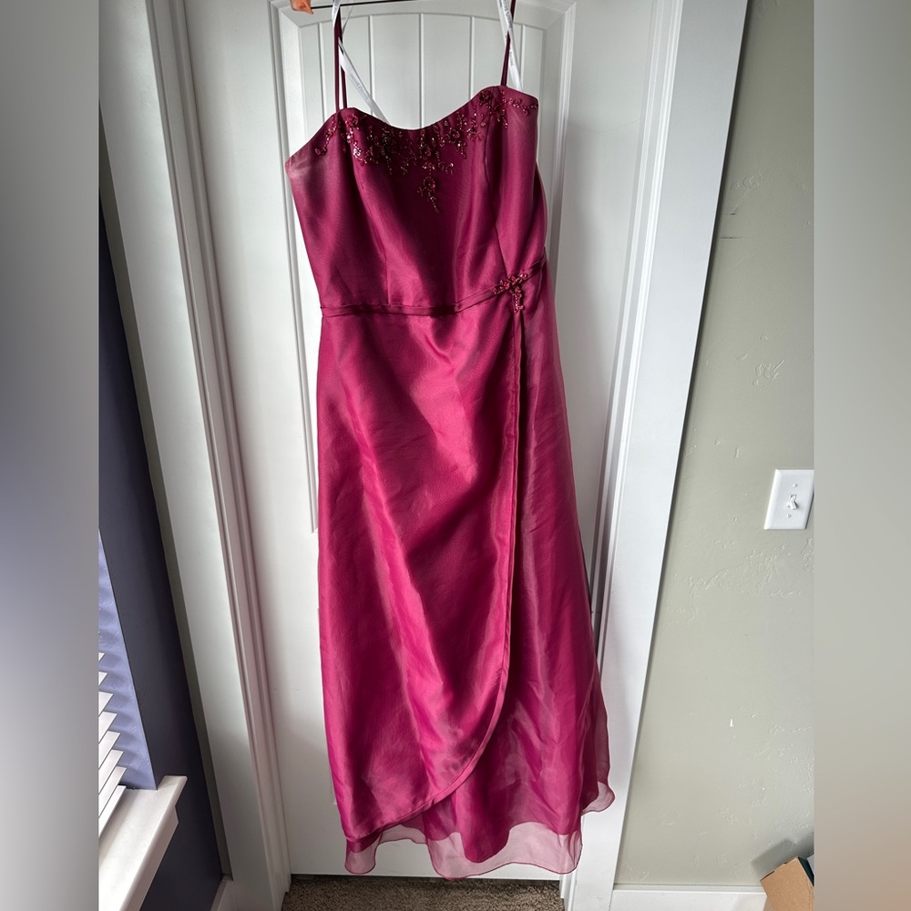 Gorgeous burgundy floor-length formal gown.
